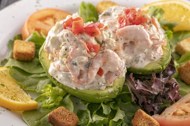 Aguacate Relleno de Camarón / Shrimp-Stuffed Avocado.